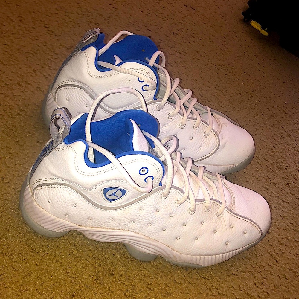 Used white and blue Jordan 14’s